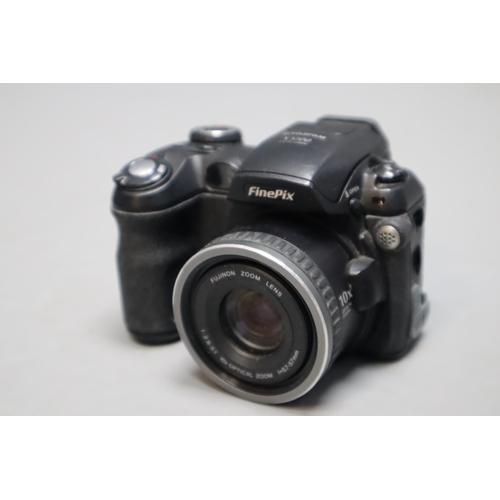 763 - Large Selection of Camera and photographic equipment including Fujifilm and Panasonic Cameras