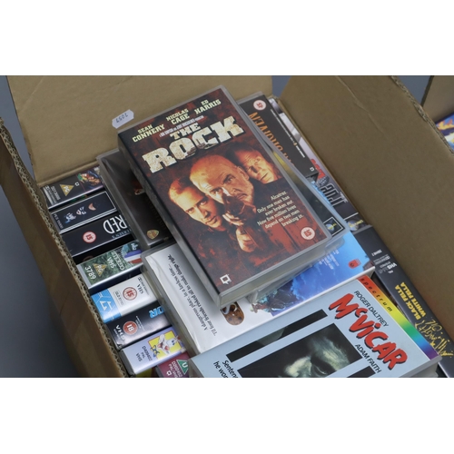 777 - Four Boxes of Unsorted VHS’. To Include Unforgiven, RoboCop, James Bond, Trainspotting, Cape F... 