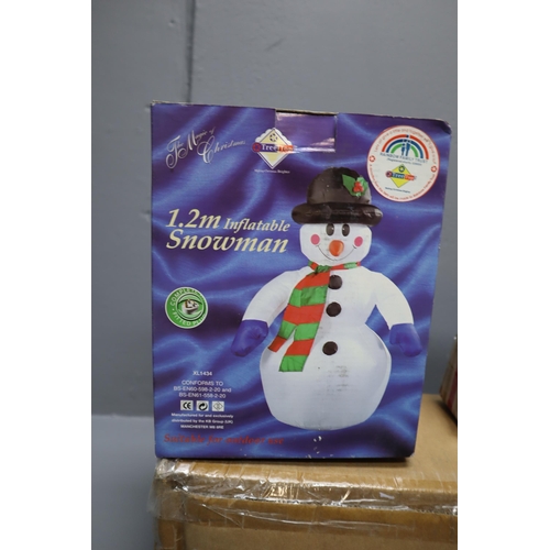 782 - Collection of Christmas items. To include, a snowman cookie jar, 1.2mtr inflatable snowman, musical ... 