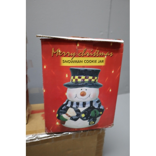 782 - Collection of Christmas items. To include, a snowman cookie jar, 1.2mtr inflatable snowman, musical ... 