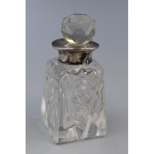 34 - Cut Glass Perfume Bottle complete with Hallmarked  Birmingham Silver Rim