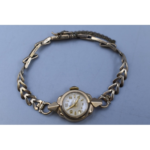 44 - An Avia De Luxe 9ct Gold Case and Strap Ladies Cocktail Watch, Watch is Approx 12.24g. Requires Atte... 