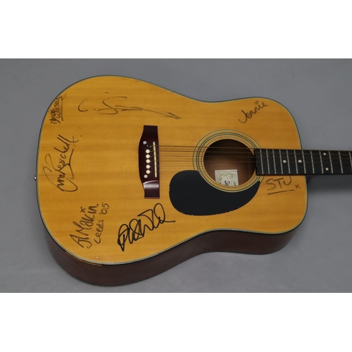 548 - Suzuki Nagoya acoustic guitar with unknown signatures on body