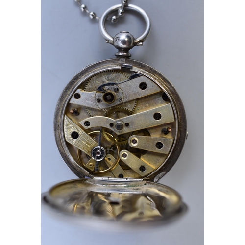 127 - Hallmarked Birmingham Silver key Wound Pocket Watch complete with Key and Chain