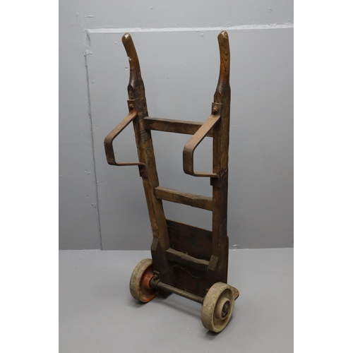 658 - Vintage wooden porters dolly/trolley/truck with heavy duty cast iron parts and heavy duty axel with ... 