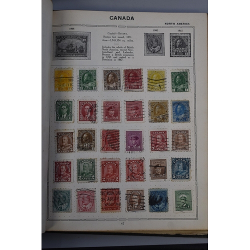 468 - Two Triumph Stamp Albums Containing A Large Selection of Vintage Worldwide Stamps (Volume I and II, ... 