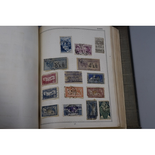 468 - Two Triumph Stamp Albums Containing A Large Selection of Vintage Worldwide Stamps (Volume I and II, ... 