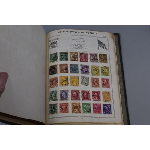 468 - Two Triumph Stamp Albums Containing A Large Selection of Vintage Worldwide Stamps (Volume I and II, ... 