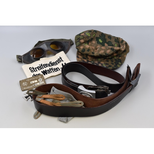 240 - A Selection of Replica German WWII Accessories To Include Two Belts, Replica Iron Cross, Military Ha... 