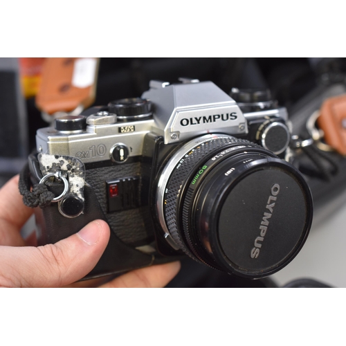 244 - Olympus OM10 35mm SLR Camera with Olympus 65-200mm Zoom Lense, Tomkins SD 28-70mm Lense, Olympus 28m... 