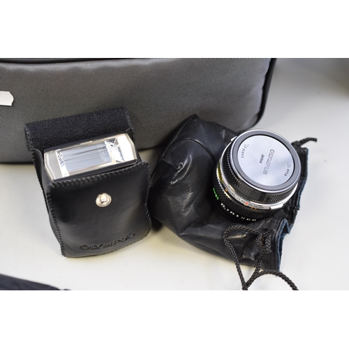 244 - Olympus OM10 35mm SLR Camera with Olympus 65-200mm Zoom Lense, Tomkins SD 28-70mm Lense, Olympus 28m... 