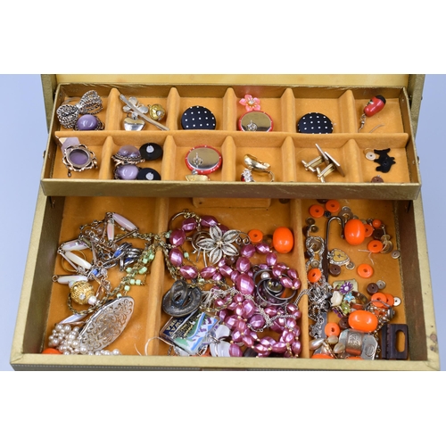 493 - A Musical Jewellery Box Containing a Selection of Unsorted Jewellery