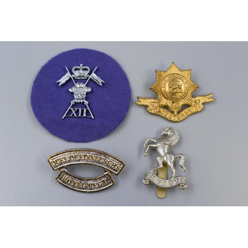 277 - Four Military Badges including Queens Home West Kent Yeomanry, Worcester, 12th Lancers and Duke of E... 