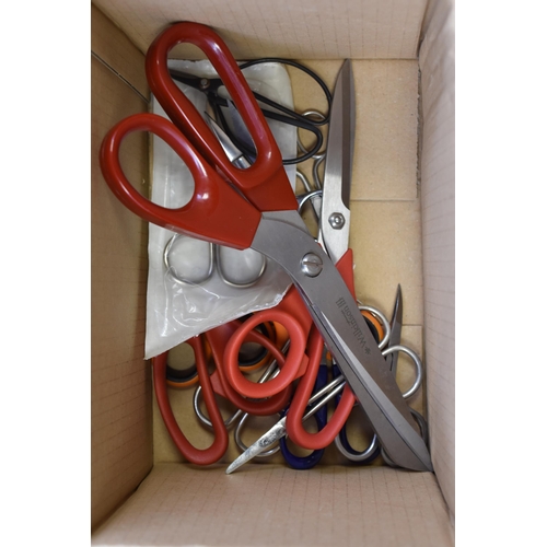 719 - 14 pairs of scissors in various sizes and applications.