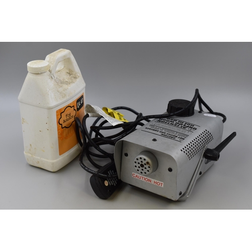 720 - Fog Machine complete with a Half Tub of Fog Solution, Powers on when tested