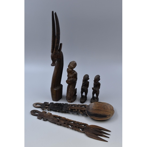 779 - A Selection Of Carved Wooden Tribal Pieces. Includes Antelope, Three Carved Figures and Others