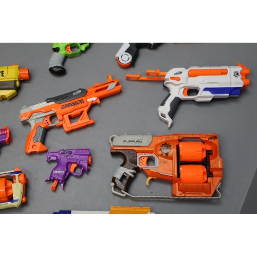 817 - A Large Selection of Nerf Guns And Ammo To Include Fortnite, Accustrike Falconfire, Modulus Recon MK... 