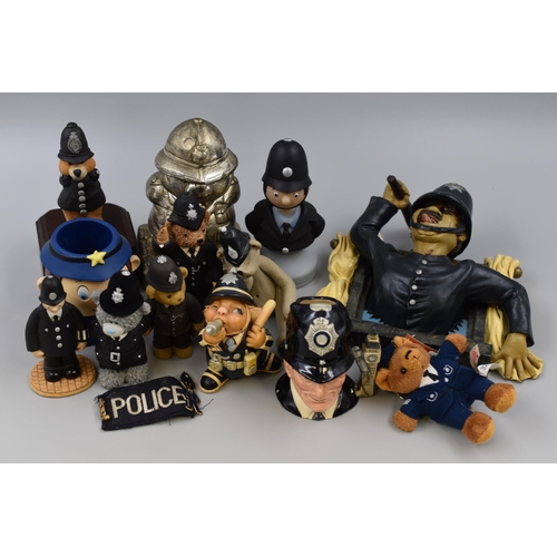 Large selection of Police figures including: A Royal Doulton Character Jug, A Police Golly Pin, A Police Teddy Bear Money Box and more