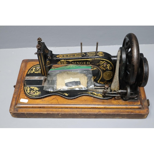 822 - Mid Century Manual Singer Sewing Machine Serial Number 76922491954849 with a Spare Needle in Wooden ... 