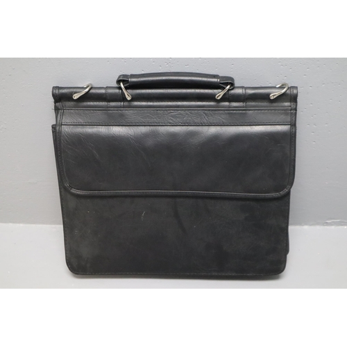 805 - Two leather attache/brief cases both measuring 15