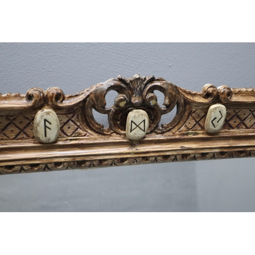 856 - An Ornate Wooden Framed Wall Mirror Decorated With Viking Runes, Approx 27