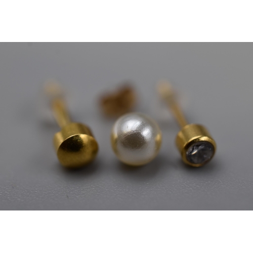 63 - Three Gold 9ct (375) Stud Earrings Complete with Cases (two with Jelly Backs / one with Gold Back)