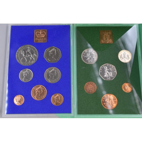 127 - Two Royal Mint Coinage of Great Britain and Northern Ireland Coin Sets (1975 & 1977)