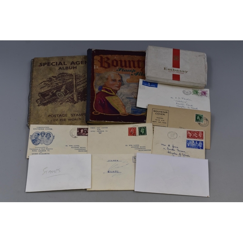 Bounty Stamp Album with a Selection of Worldwide Definitive Stamps and a Collective Used Mounted Stamps and First Day Covers