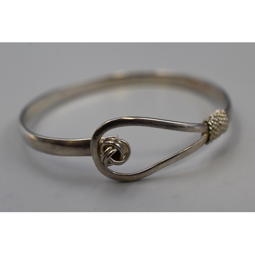 A 925. Silver Loop and Knot Bangle