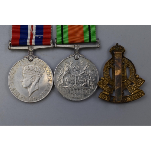 241 - World War II George VI Medal Set with Ribbons and a Royal Army Ordnance Cap Badge