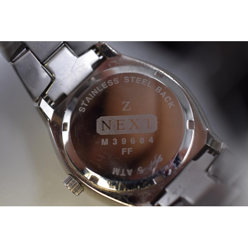 105 - A Next Gent's Quartz Calendar Watch With Stainless Steel Strap