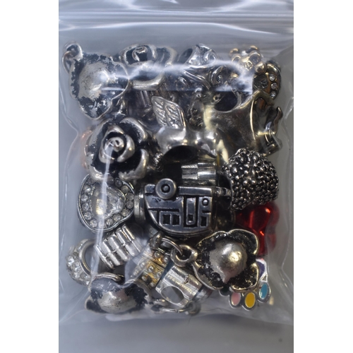 112 - Large Selection of Glass and Metal Charms