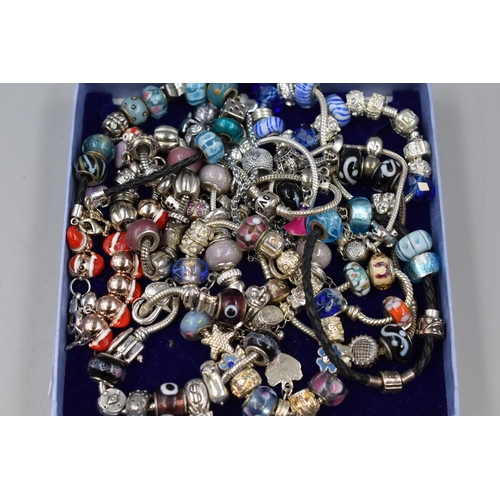 114 - Large Selection of unsorted Beaded Bracelets