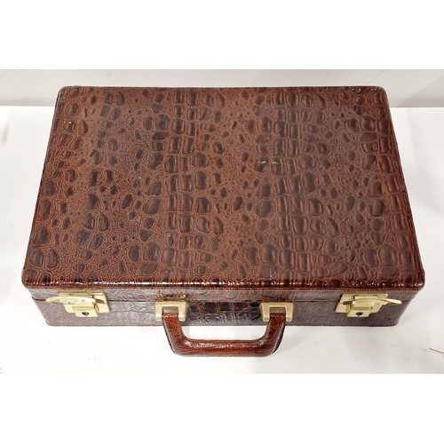 488 - Crocodile Skin Style Brief Case Full of Audio Cassettes includes loads of oldies.