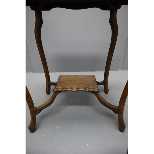 576 - Two tier antique dark wood side table (29