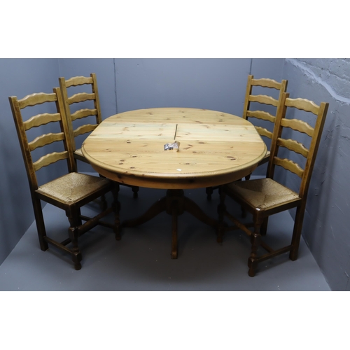 601 - Round pine extendable table and 4 chairs (45