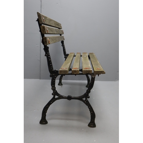 605 - wrought iron and wooden bench (42