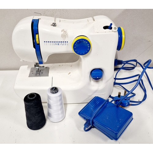 561 - Ikea Sewing Machine. 13 Stitch types. Working with 2 bobbins of cotton.