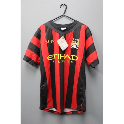 617 - Official Manchester City Away Shirt (Size 38) Complete with Tags