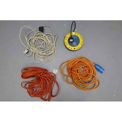 806 - Four long extension leads including a caravan plug