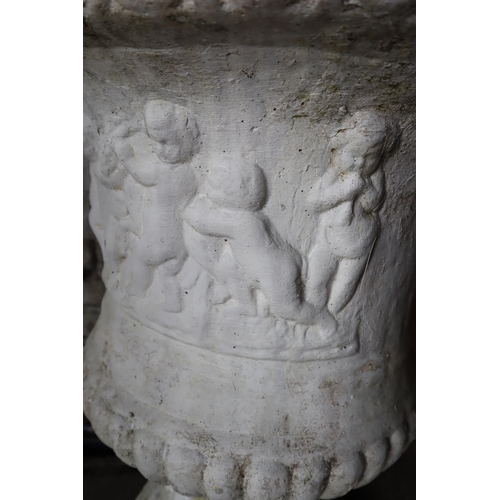 591 - Two heavy white garden stone urns with separate pedestals measuring 19