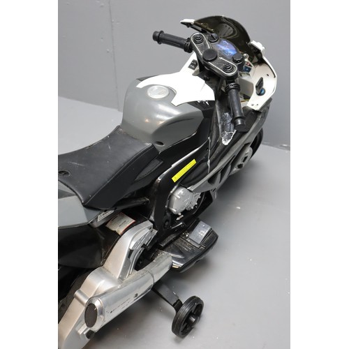 626 - Child's BMW Battery Powered Motorbike with stabilisers Fitted untested item no charger present. NO P... 