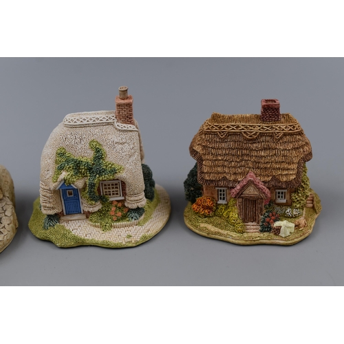 242 - Selection of five Lilliput lane cottages to include Milestone cottage, Rierview, Wash day, Petticoat... 
