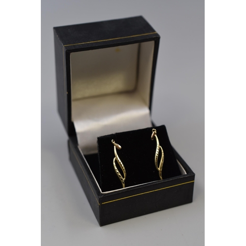 9 - Pair of Unmarked tested 9ct Gold Earrings Complete with Presentation Box