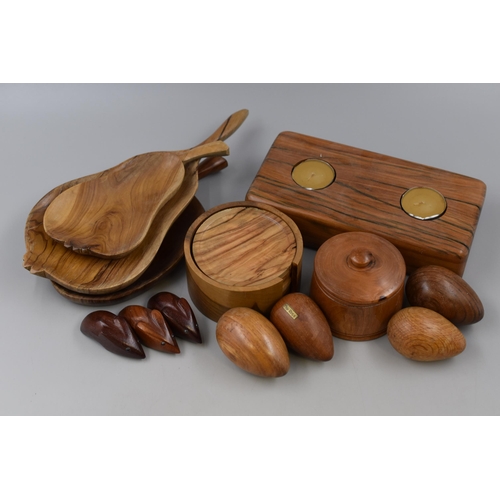 289 - A selection of wooden items including: A tea light candle holder, Set of six coasters and more