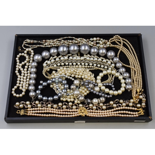 146 - Large Selection of Simulated Pearl Necklaces