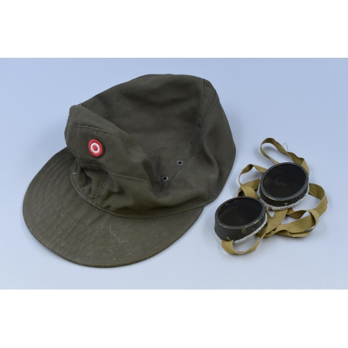 299 - A German Second World War Cap and Flying Goggles