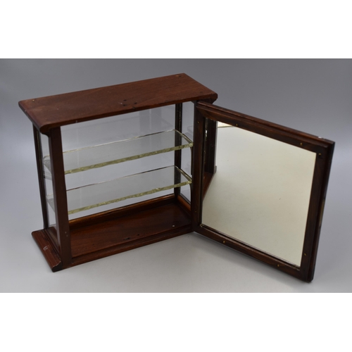 389 - Small antique jewelers display cabinet in dark wood with glass shelves and brass fittings with door ... 