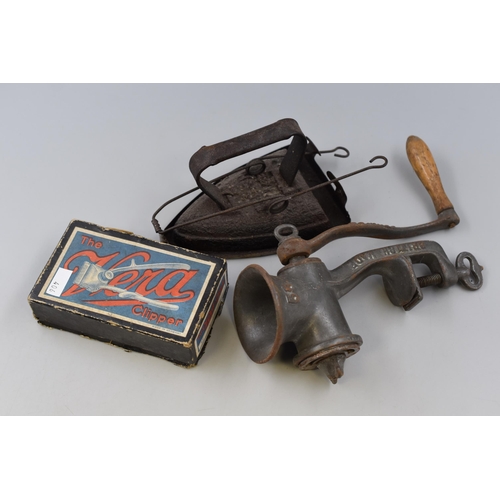 399 - A small mixed lot to include: Antique Metal Cast Flat Iron, A Metal Antique Meat Grinder and The Ver... 