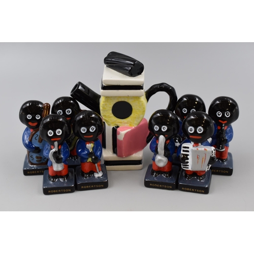 347 - A Robertson's Eight Piece Ceramic Golly Band Figures, With Liquorice Allsorts Miniature Teapot